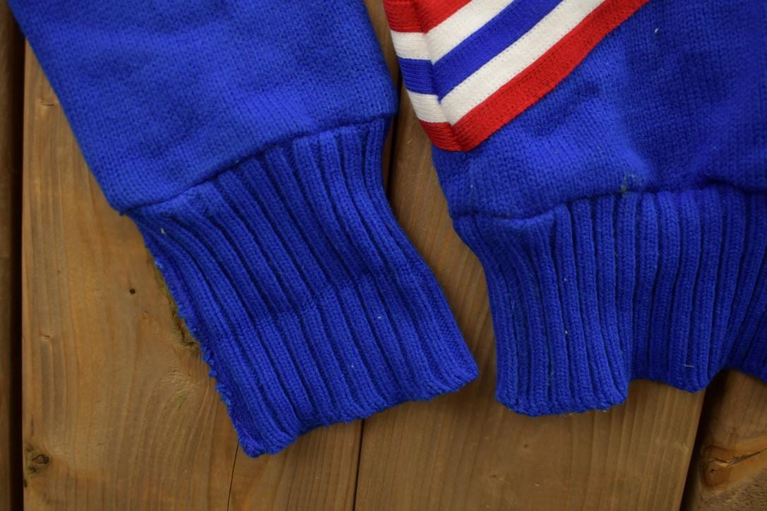 Vintage 1970s Vets Cheerleading Abstract Knitted Crewneck Sweater Men's Small from propervintagecanada