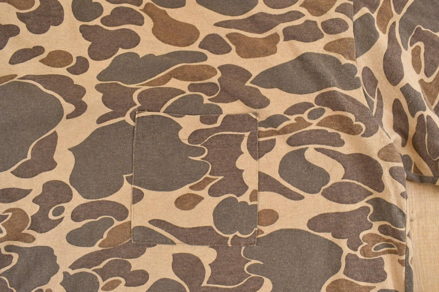 Vintage 1980's Camo Pocket Souvenir Outdoorsman T-Shirt Men's L from propervintagecanada