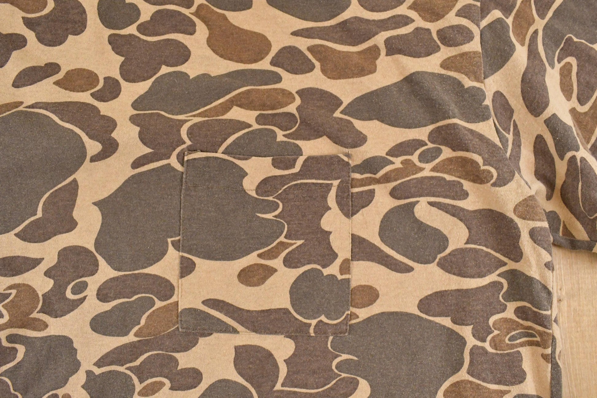 Vintage 1980's Camo Pocket Souvenir Outdoorsman T-Shirt Men's L from propervintagecanada