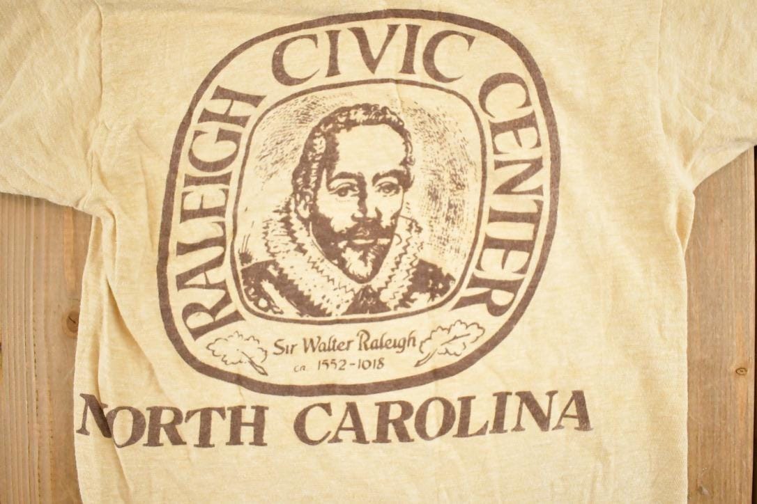 Vintage 1980's Raleigh Civic Centre Souvenir Travel Ringer T-Shirt Men's XS from propervintagecanada