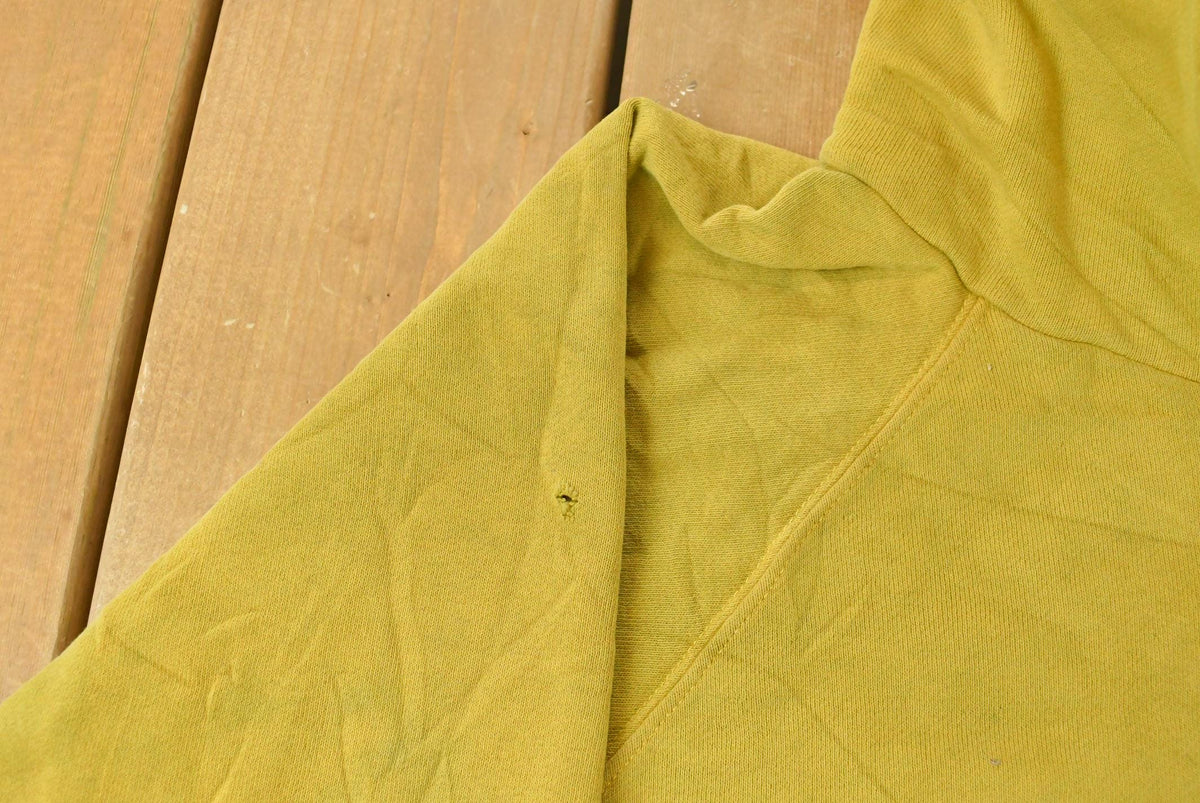 Vintage 1980's Thrashed Blank Hoodie Sweatshirt Men's XL from propervintagecanada