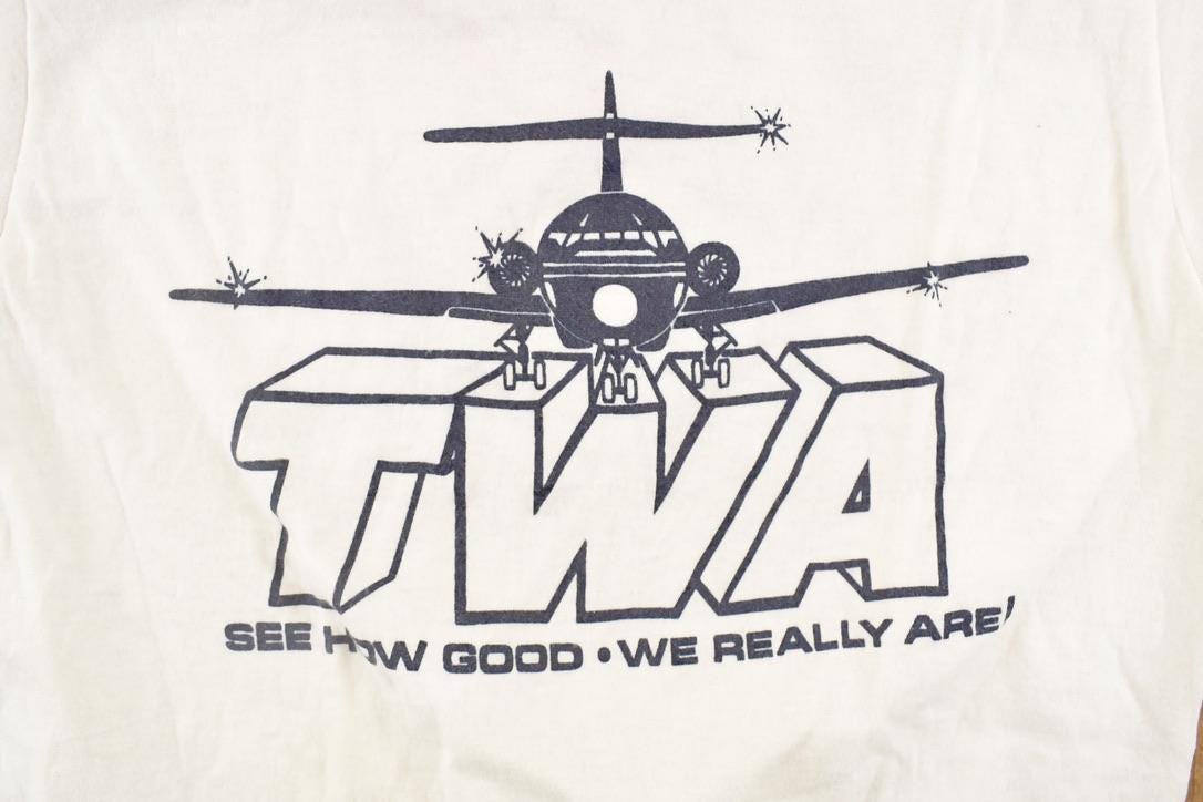 Vintage 1980's TWA Airplanes Souvenir Ringer T-Shirt Men's S from propervintagecanada