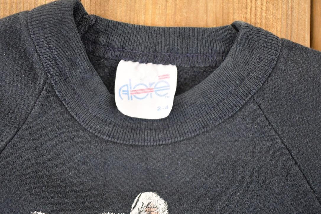 Vintage 1980s Alore South Dakota White Lions Souvenir Travel Sweater Youth 2 from propervintagecanada