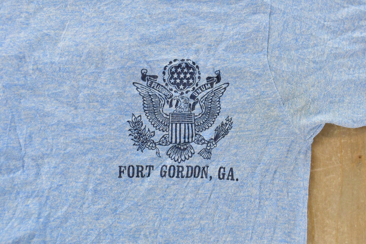 Vintage 1980s Army Fort Gordon Graphic Ringer T-Shirt Men's L from propervintagecanada