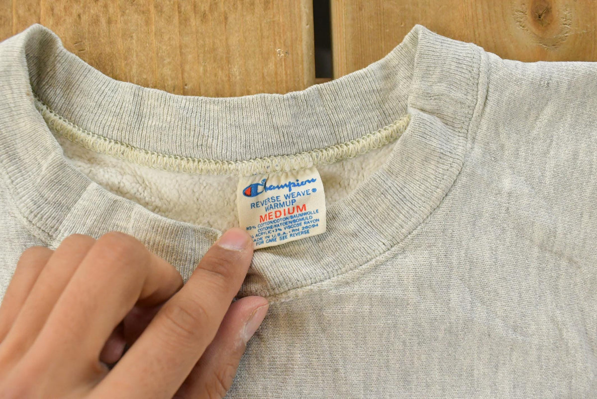 Vintage 1980s Assumption College Champion Reverse Weave Crewneck Sweatshirt Men's M from propervintagecanada