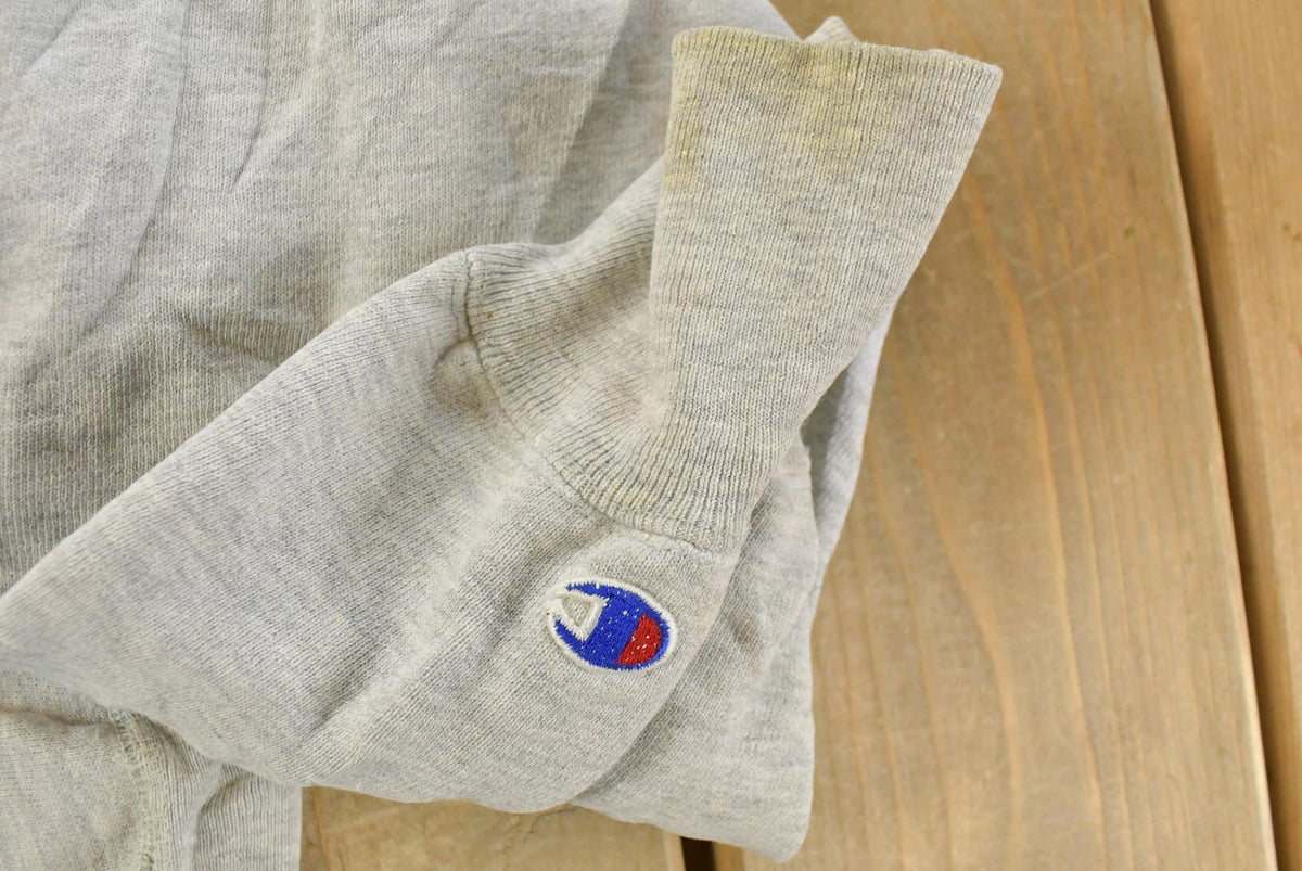 Vintage 1980s Assumption College Champion Reverse Weave Crewneck Sweatshirt Men's M from propervintagecanada
