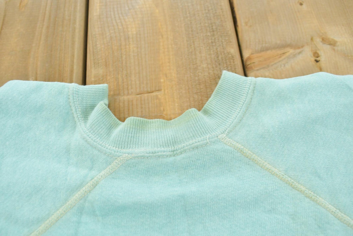Vintage 1980s Blank Light Blue Raglan Crewneck Sweatshirt Mens S from propervintagecanada