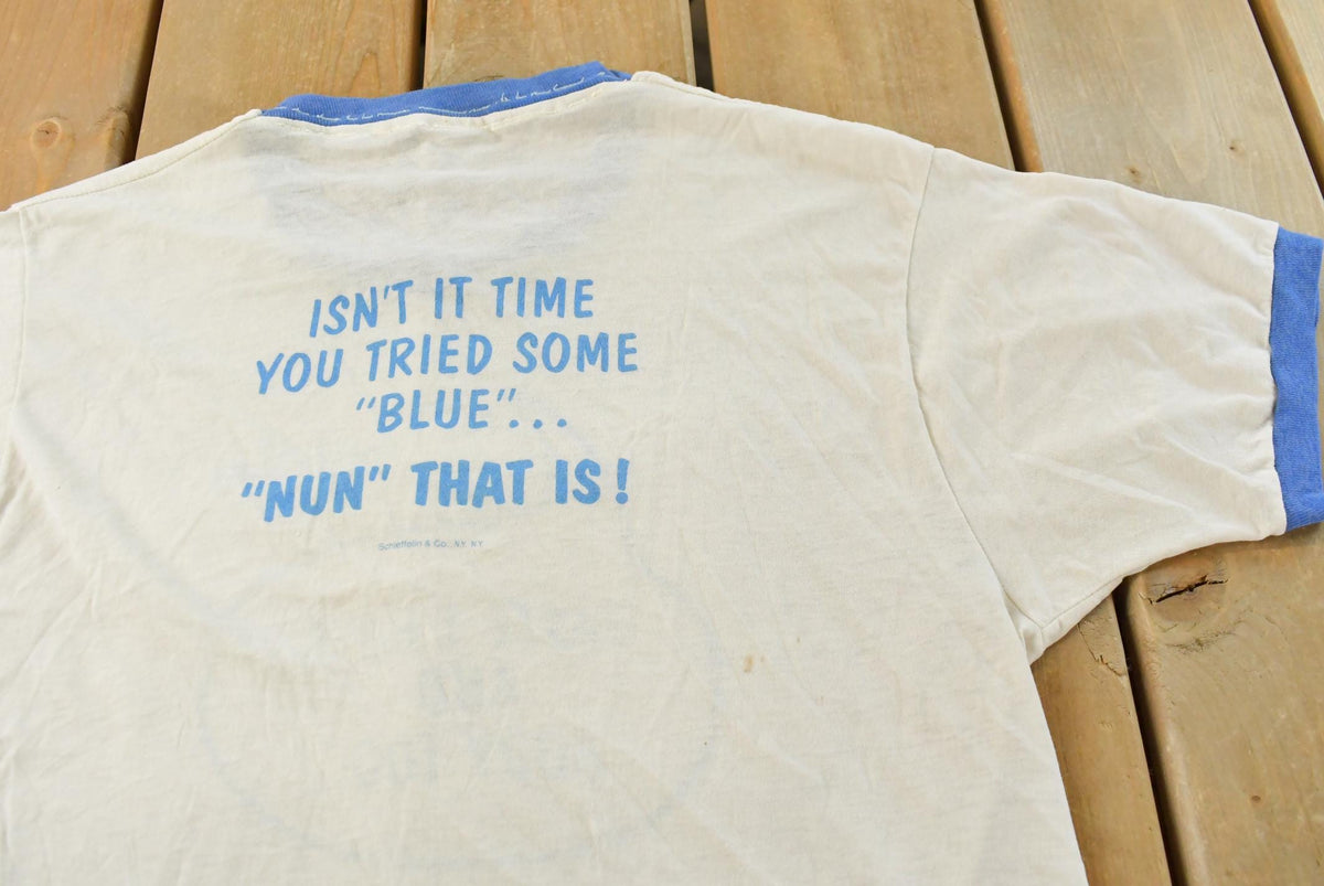 Vintage 1980s Blue Nun Ringer Graphic T Shirt Mens M from propervintagecanada