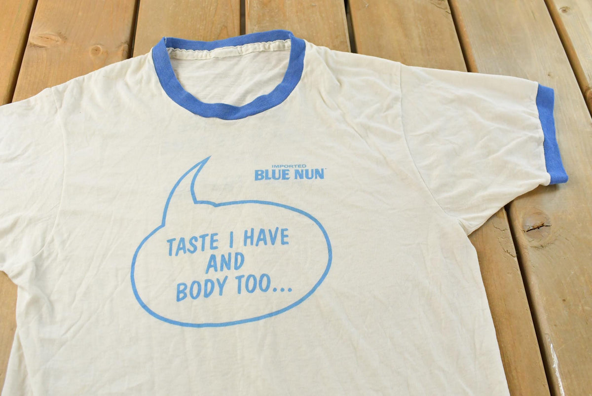 Vintage 1980s Blue Nun Ringer Graphic T Shirt Mens M from propervintagecanada