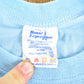 Vintage 1980s Bonne Experience Baby Blue Blank Ringer Sleeve T-Shirt Mens S from propervintagecanada