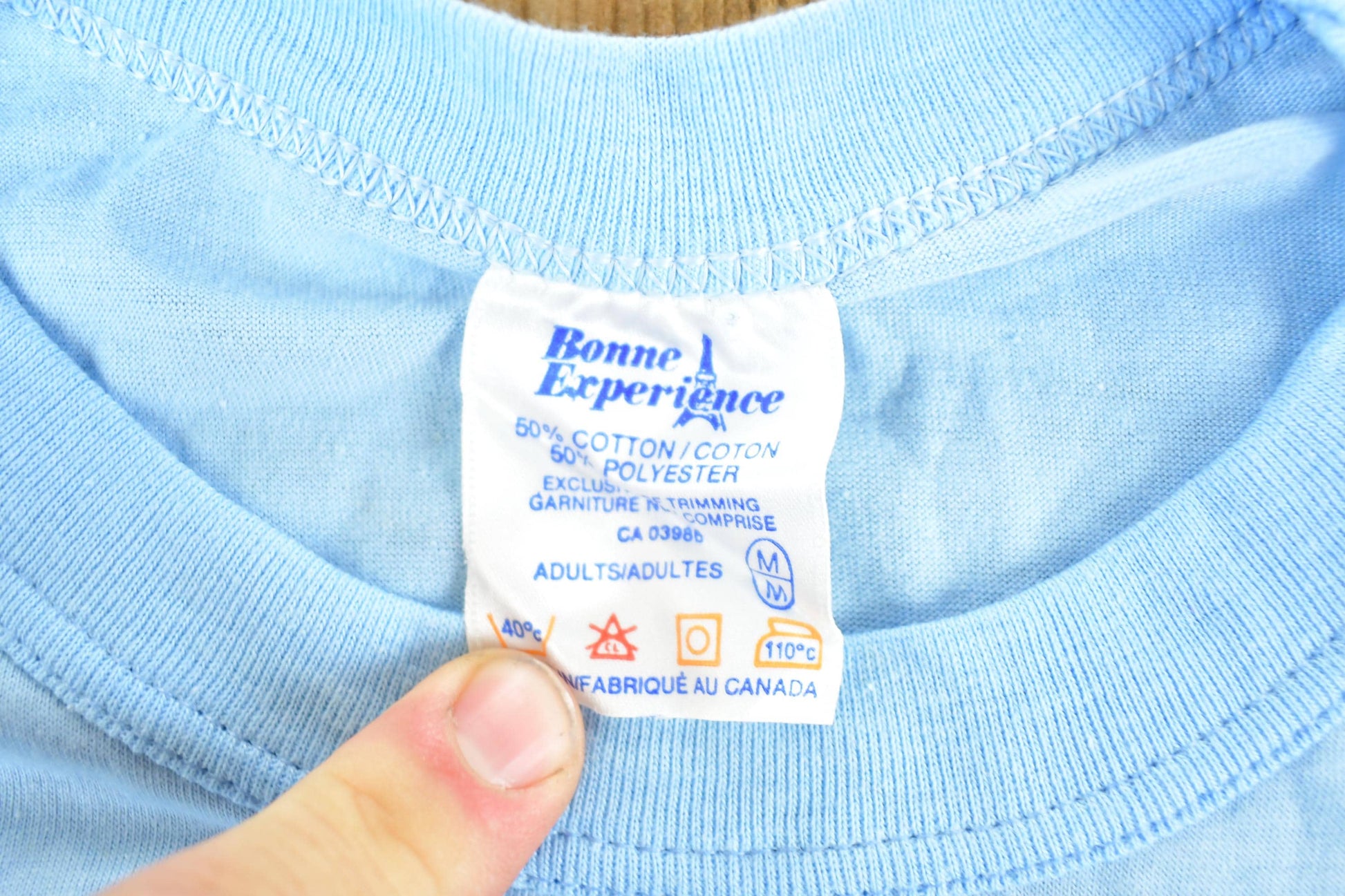 Vintage 1980s Bonne Experience Baby Blue Blank Ringer Sleeve T-Shirt Mens S from propervintagecanada