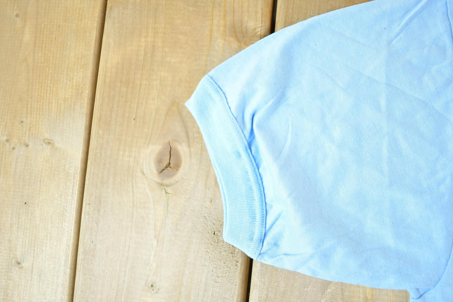Vintage 1980s Bonne Experience Baby Blue Blank Ringer Sleeve T-Shirt Mens S from propervintagecanada