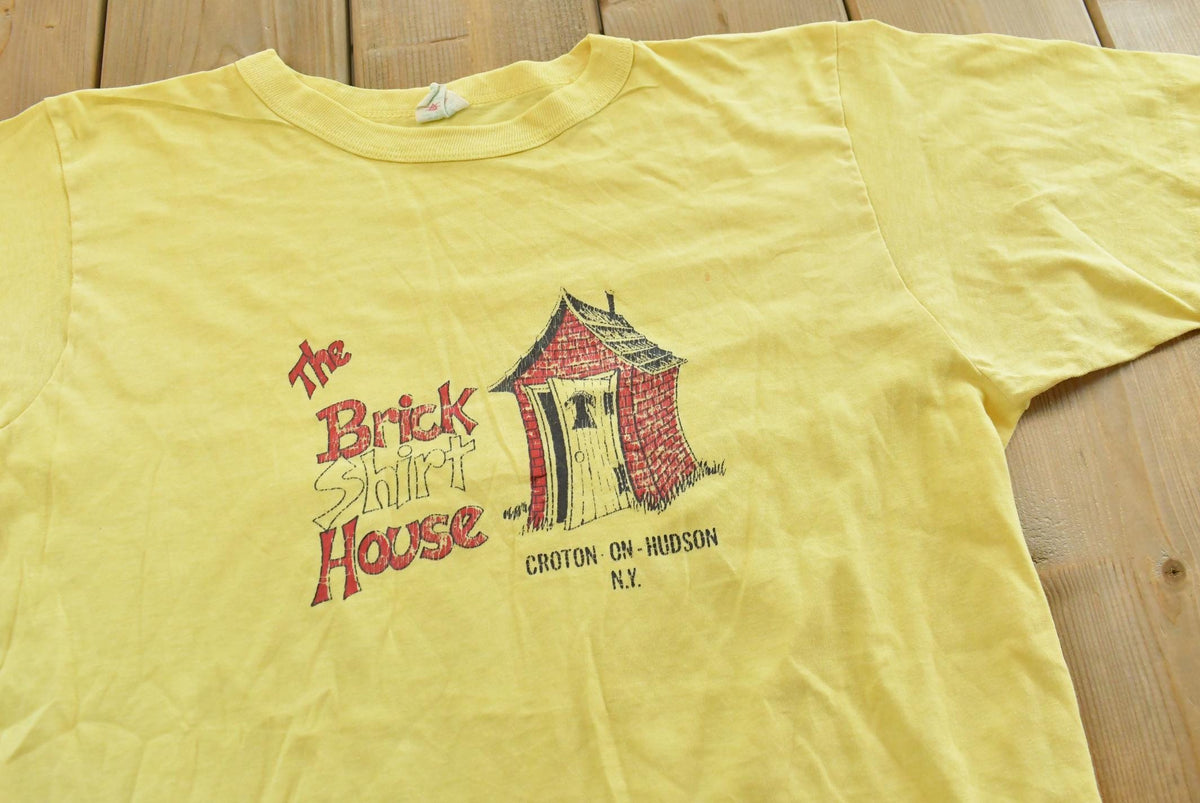 Vintage 1980s Brick Shirt House Funny Cartoon T-Shirt Mens L from propervintagecanada
