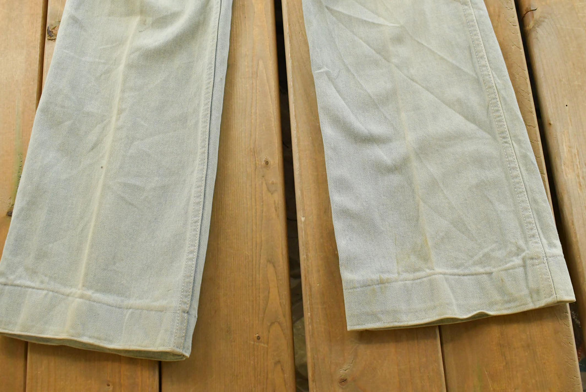Vintage 1980s Britania Distressed Flare Denim Blue Jeans 30 x 30.5 from propervintagecanada