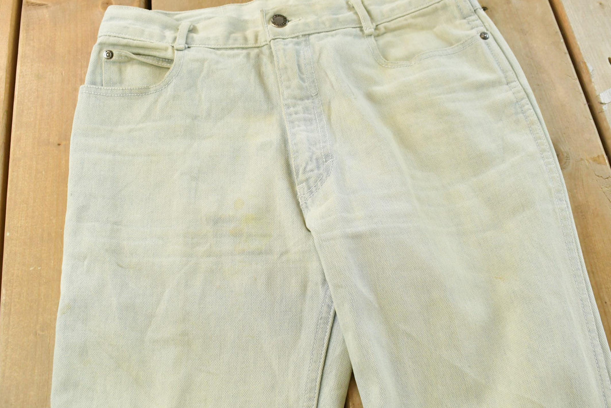 Vintage 1980s Britania Distressed Flare Denim Blue Jeans 30 x 30.5 from propervintagecanada