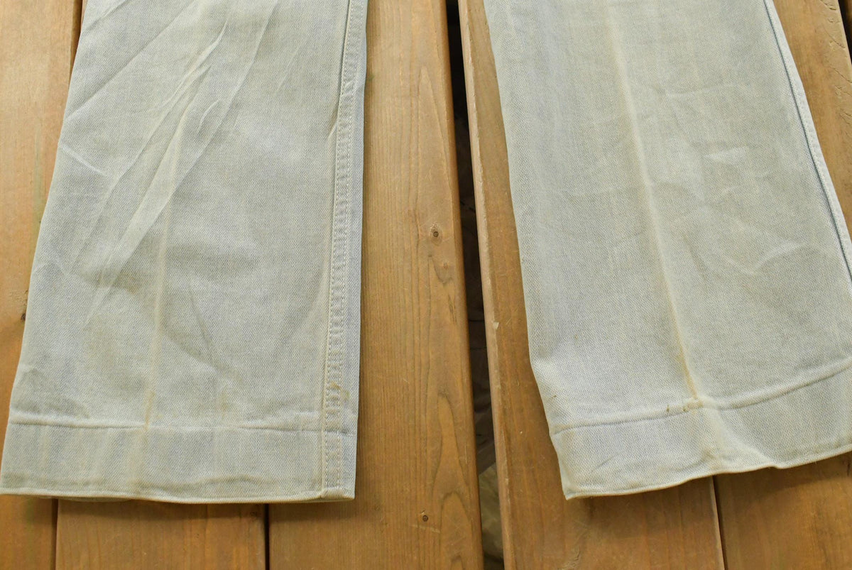 Vintage 1980s Britania Distressed Flare Denim Blue Jeans 30 x 30.5 from propervintagecanada