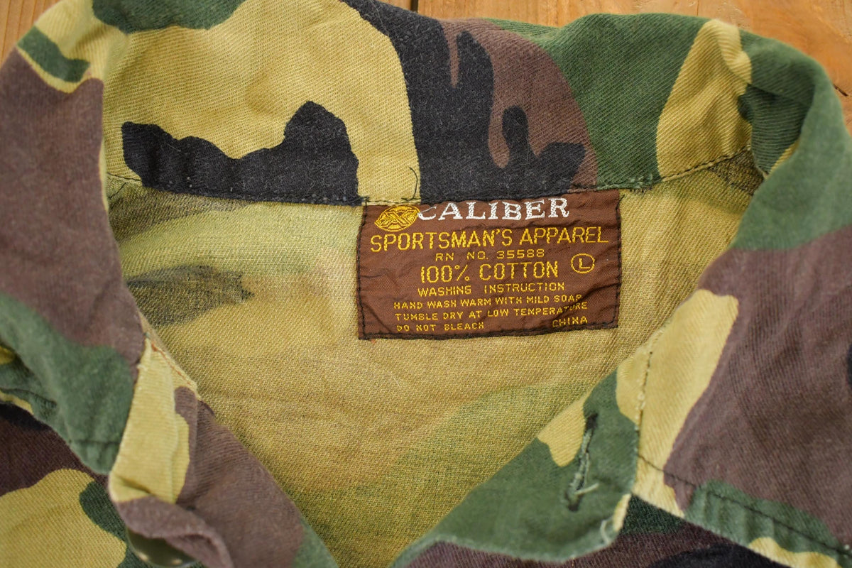 Vintage 1980s Caliber Sportsman Apparel Camo Button Up Shirt Men's L from propervintagecanada