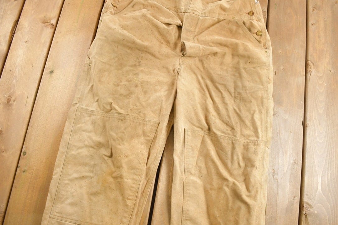 Vintage 1980s Carhartt Beige Canvas Double Knee Overalls Men's 42 x 30 from propervintagecanada