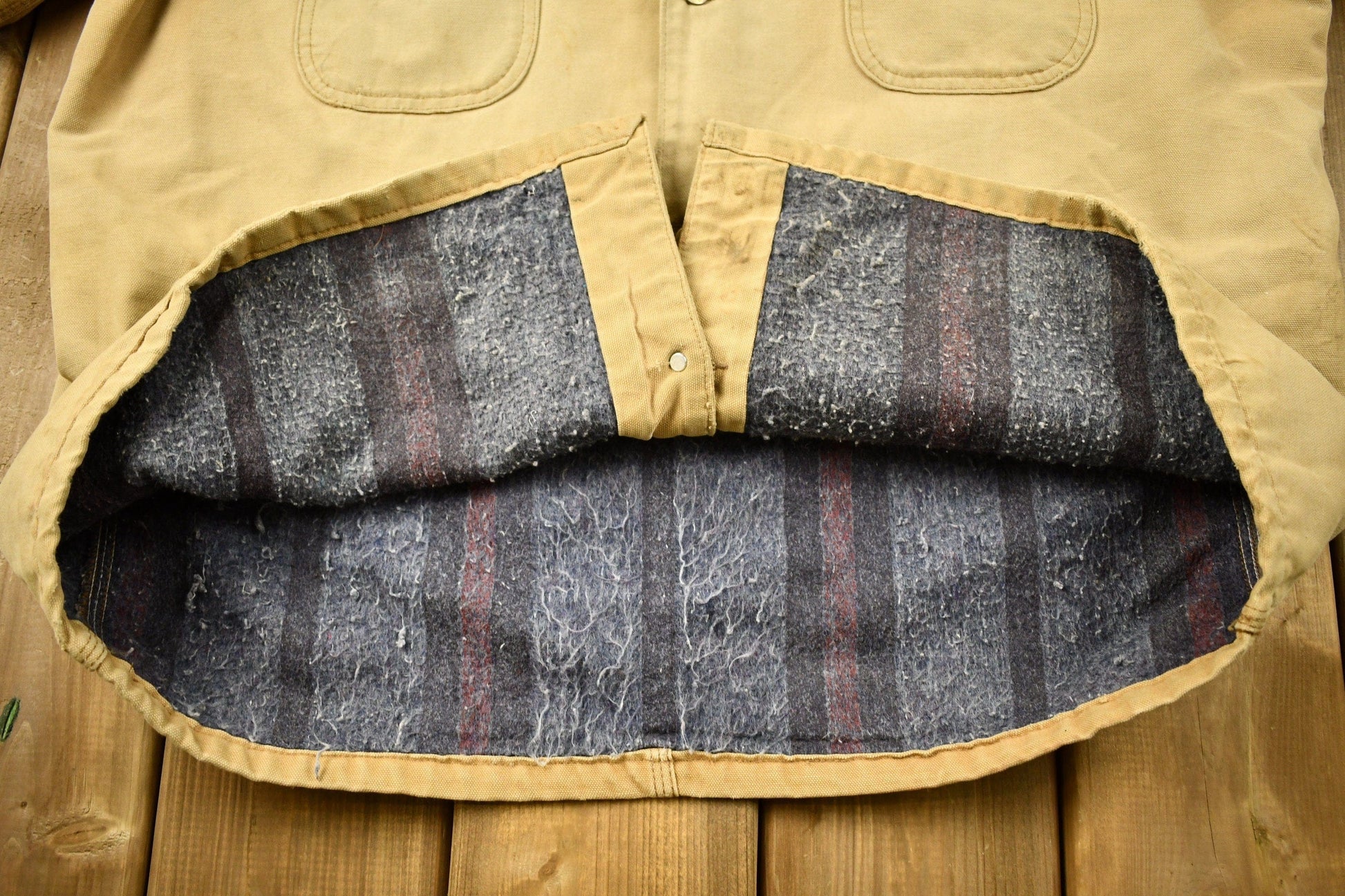 Vintage 1980s Carhartt Blanket Lined Chore Coat Men's 2XL from propervintagecanada