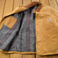 Vintage 1980s Carhartt Blanket Lined Chore Coat Men's XL from propervintagecanada