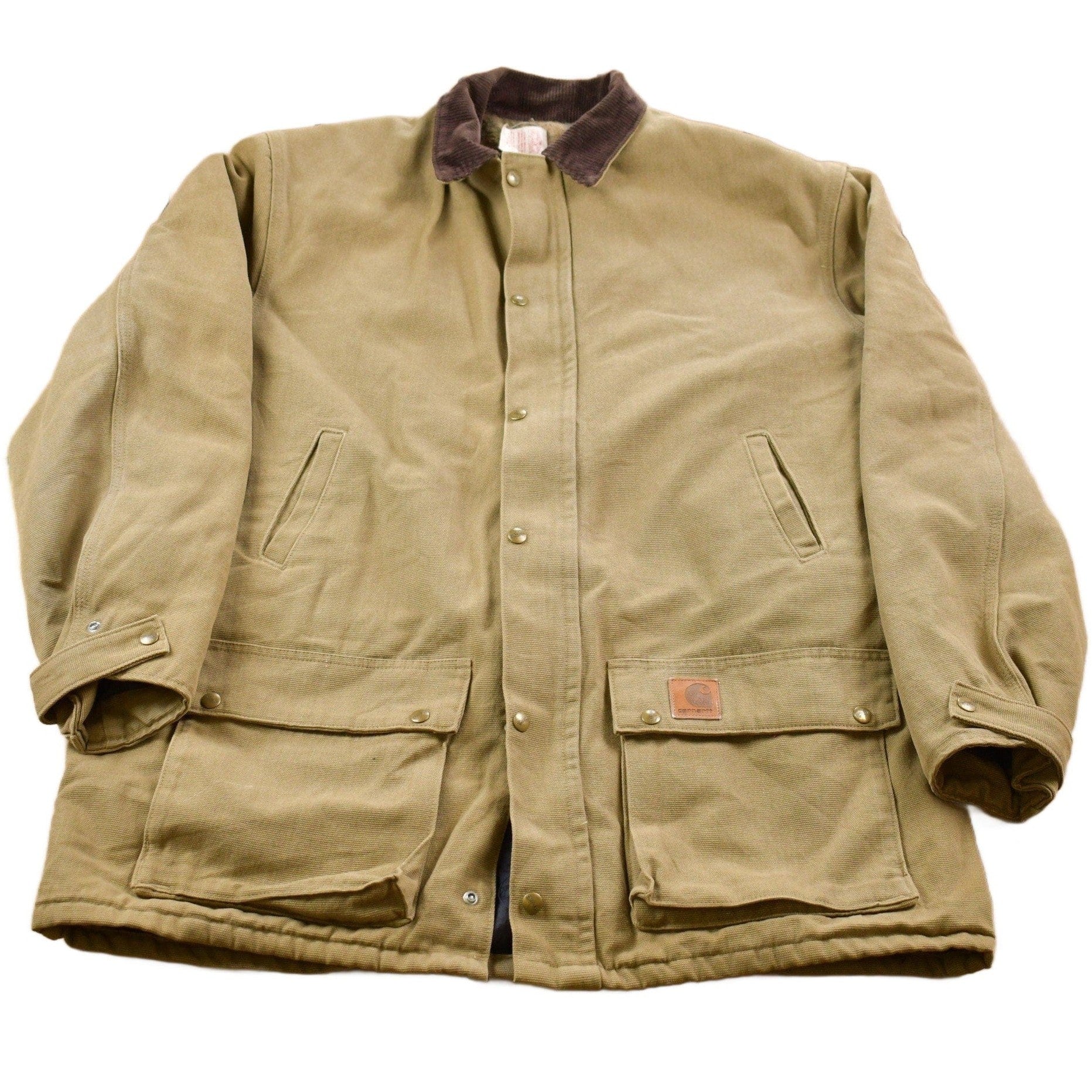 Vintage 1980s Carhartt Chore Coat Olive Green Men's XL Tall from propervintagecanada