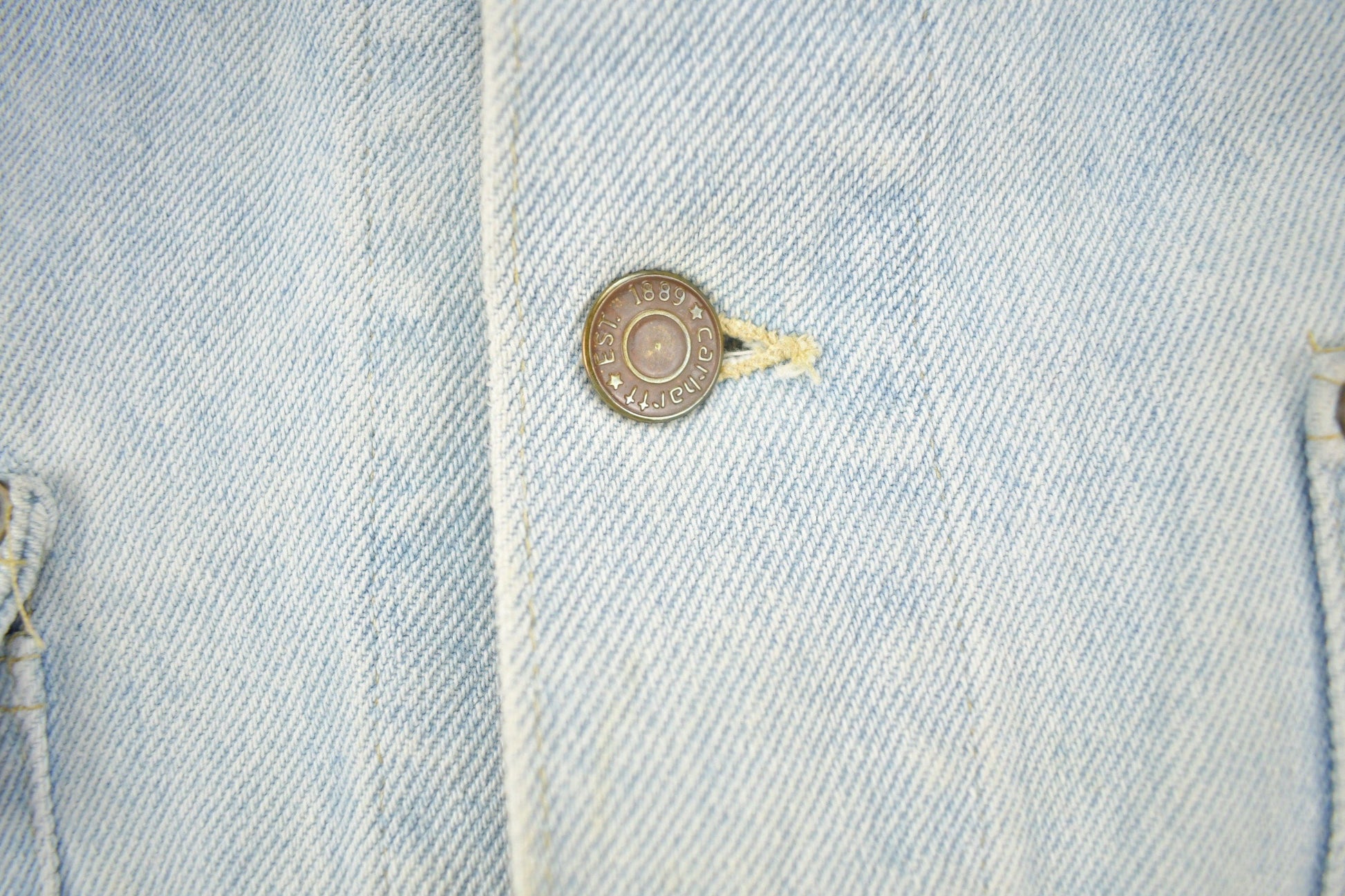 Vintage 1980s Carhartt Detroit Light Wash Denim Jean Jacket Men's XL from propervintagecanada