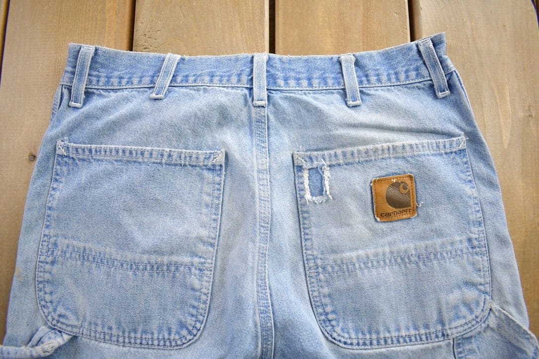 Vintage 1980s Carhartt Distressed Denim Jeans Men's 30 x 30 from propervintagecanada
