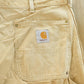 Vintage 1980s Carhartt Distressed Sun Faded Double Knee Pants Men's 37 x 29 from propervintagecanada