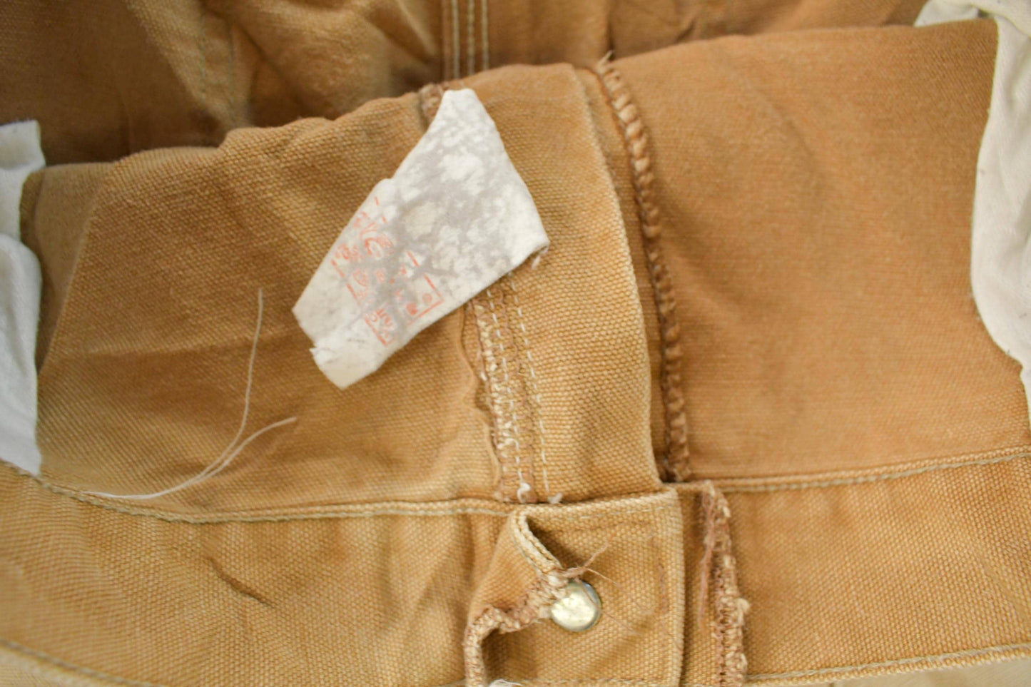Vintage 1980s Carhartt Distressed Sun Faded Double Knee Pants Men's 37 x 29 from propervintagecanada
