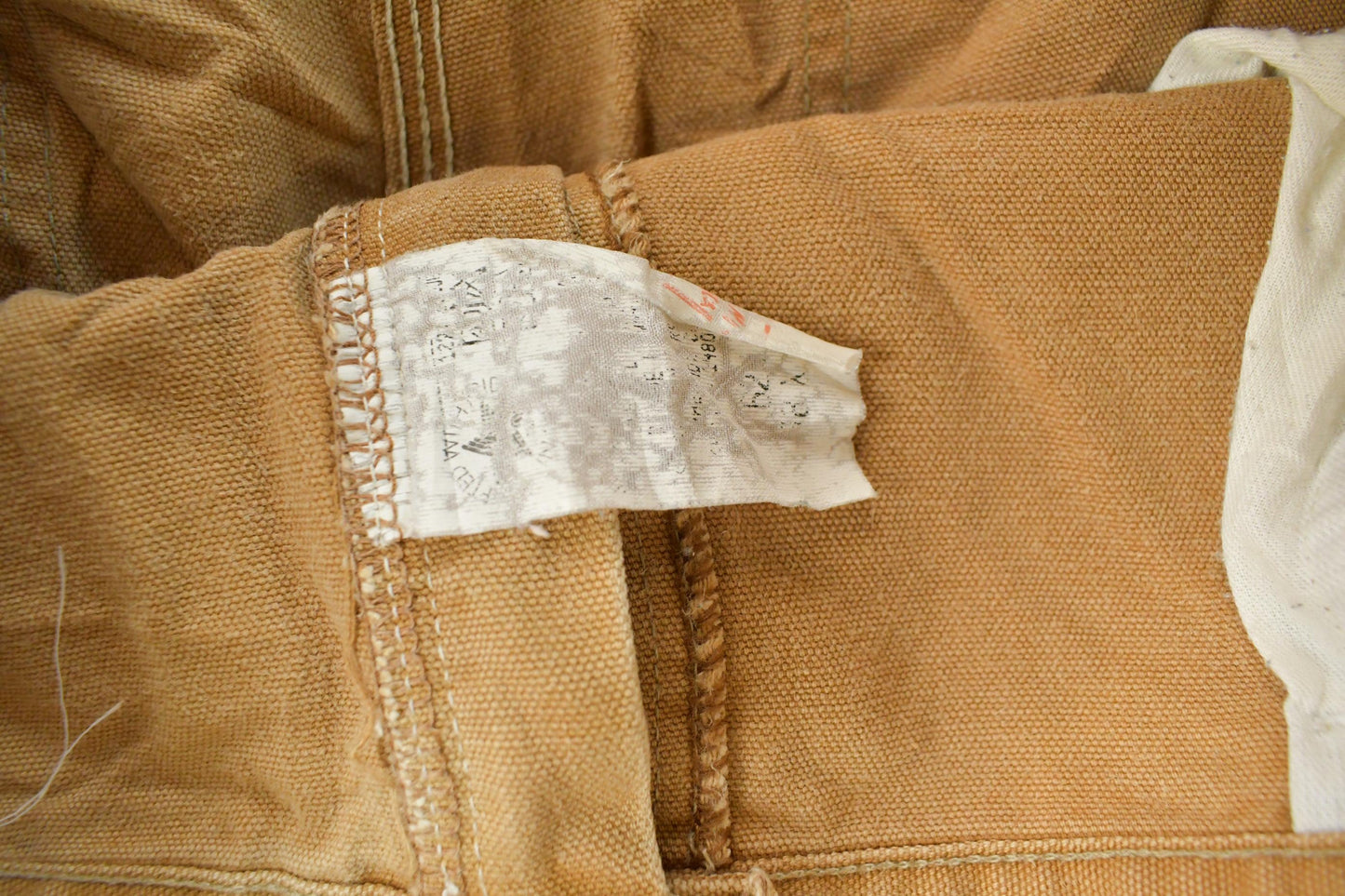 Vintage 1980s Carhartt Distressed Sun Faded Double Knee Pants Men's 37 x 29 from propervintagecanada