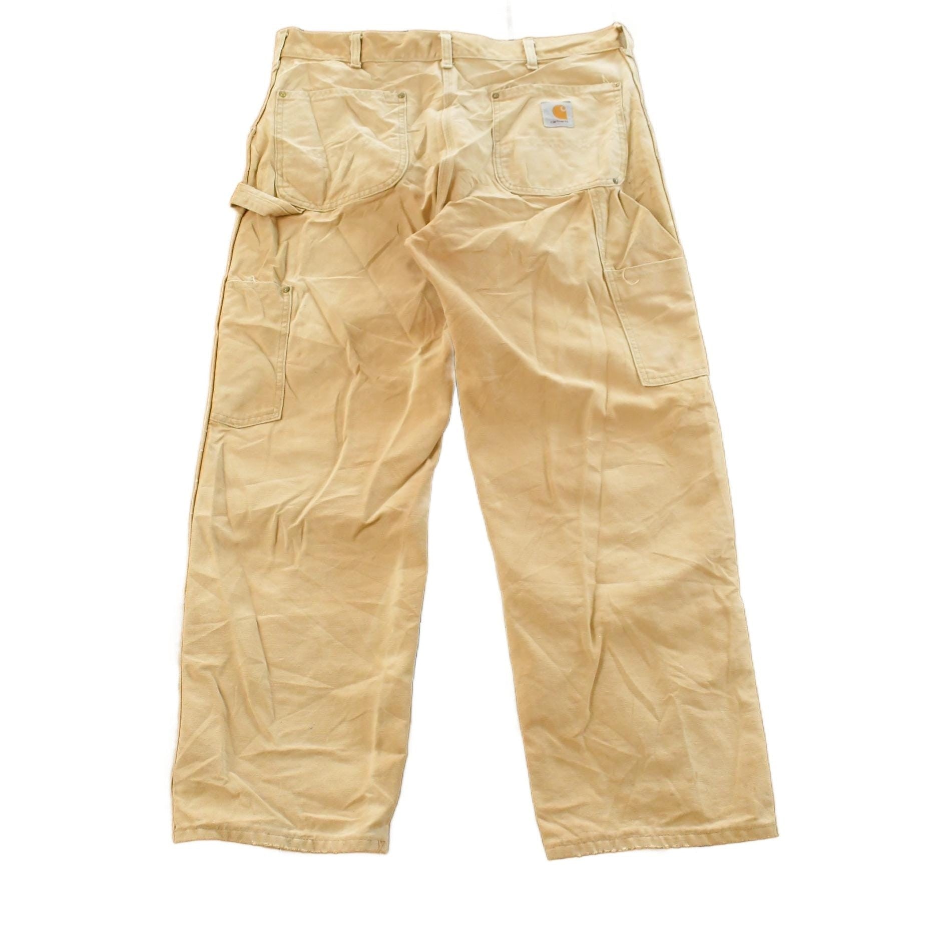 Vintage 1980s Carhartt Distressed Sun Faded Double Knee Pants Men's 37 x 29 from propervintagecanada