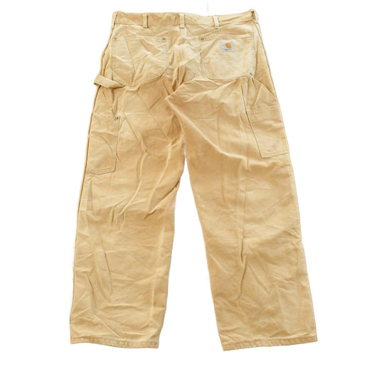 Vintage 1980s Carhartt Distressed Sun Faded Double Knee Pants Men's 37 x 29 from propervintagecanada