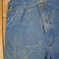 Vintage 1980s Carhartt Double Knee Distressed Denim Overalls Men's 36 x 30 from propervintagecanada