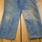 Vintage 1980s Carhartt Double Knee Distressed Denim Overalls Men's 36 x 30 from propervintagecanada