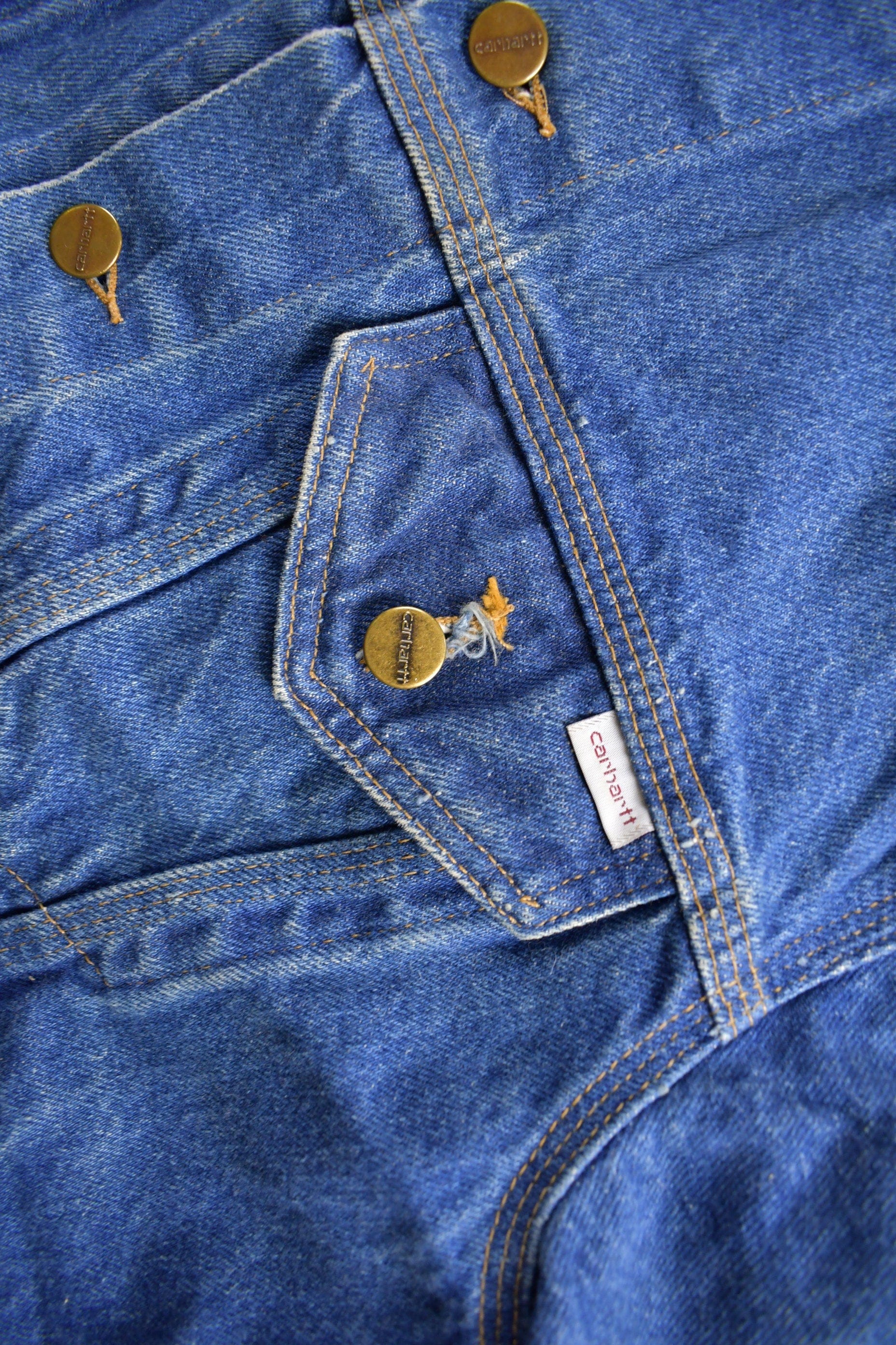 Vintage 1980s Carhartt Medium Wash Jean Jacket Men's M from propervintagecanada