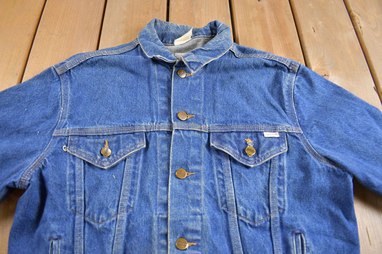 Vintage 1980s Carhartt Medium Wash Jean Jacket Men's M from propervintagecanada