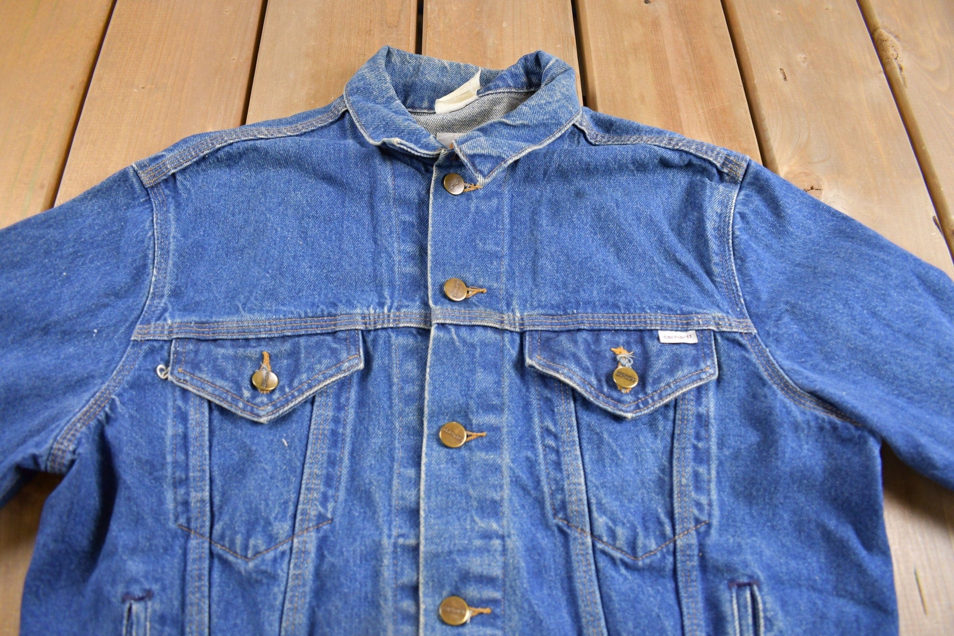 Vintage 1980s Carhartt Medium Wash Jean Jacket Men's M from propervintagecanada