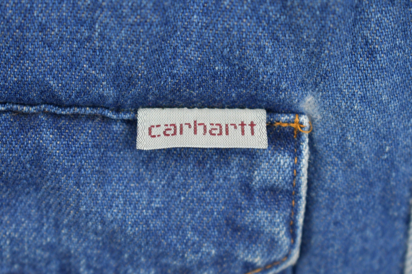 Vintage 1980s Carhartt Pearl Snap Denim Shirt Men's Medium from propervintagecanada