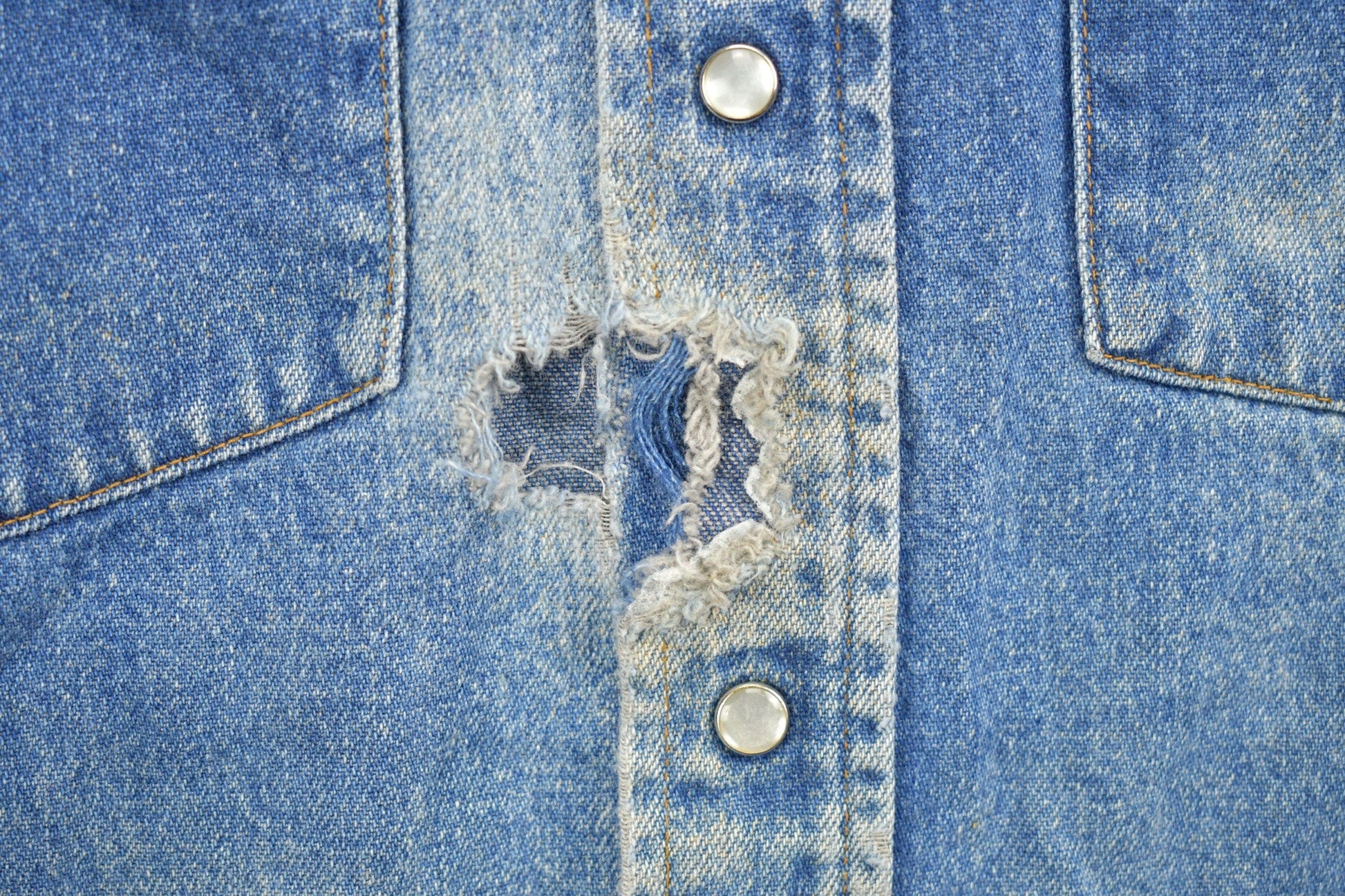 Vintage 1980s Carhartt Pearl Snap Denim Shirt Men's Medium from propervintagecanada