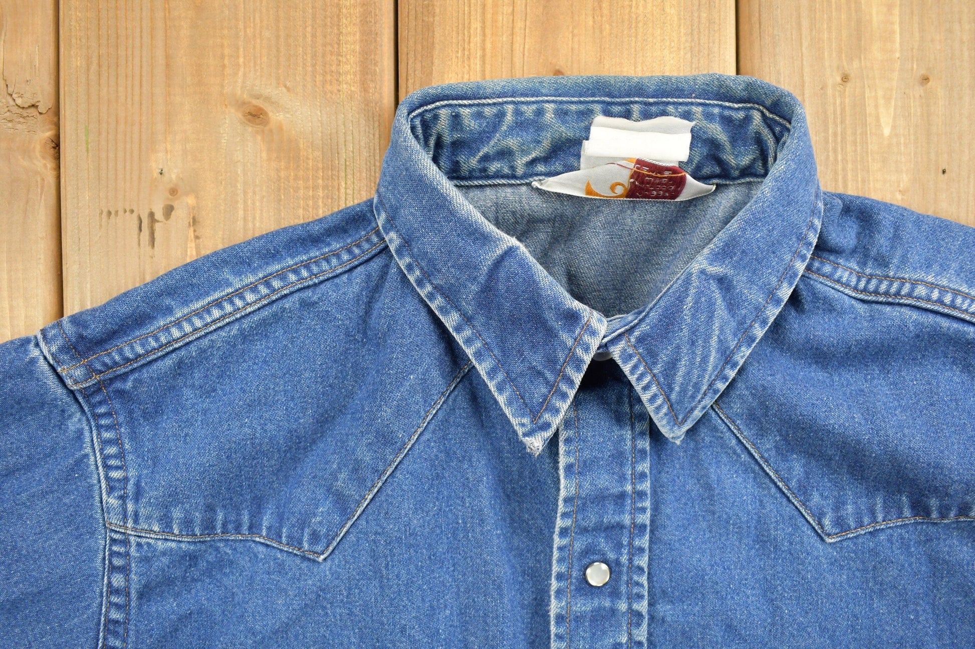 Vintage 1980s Carhartt Pearl Snap Denim Shirt Men's Medium from propervintagecanada