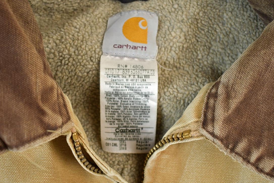Vintage 1980s Carhartt Perfectly Distressed Collared Work Jacket Men's 2XL from propervintagecanada