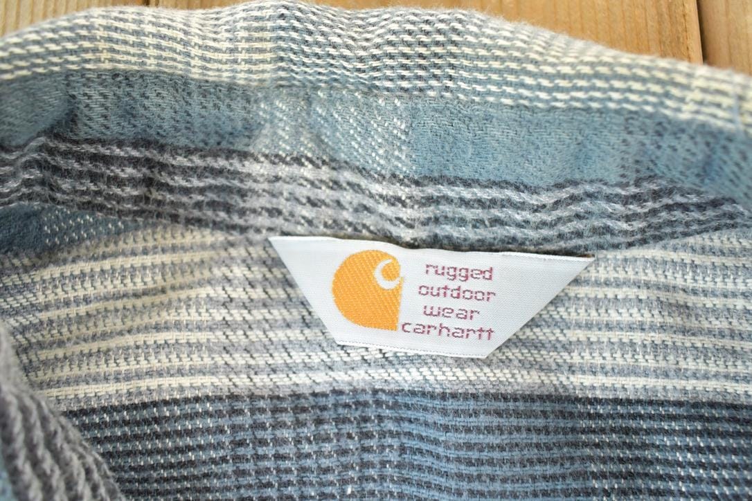 Vintage 1980s Carhartt Rugged Outdoor Wear Plaid Heavy Flannel Button Up Shirt Mens L from propervintagecanada