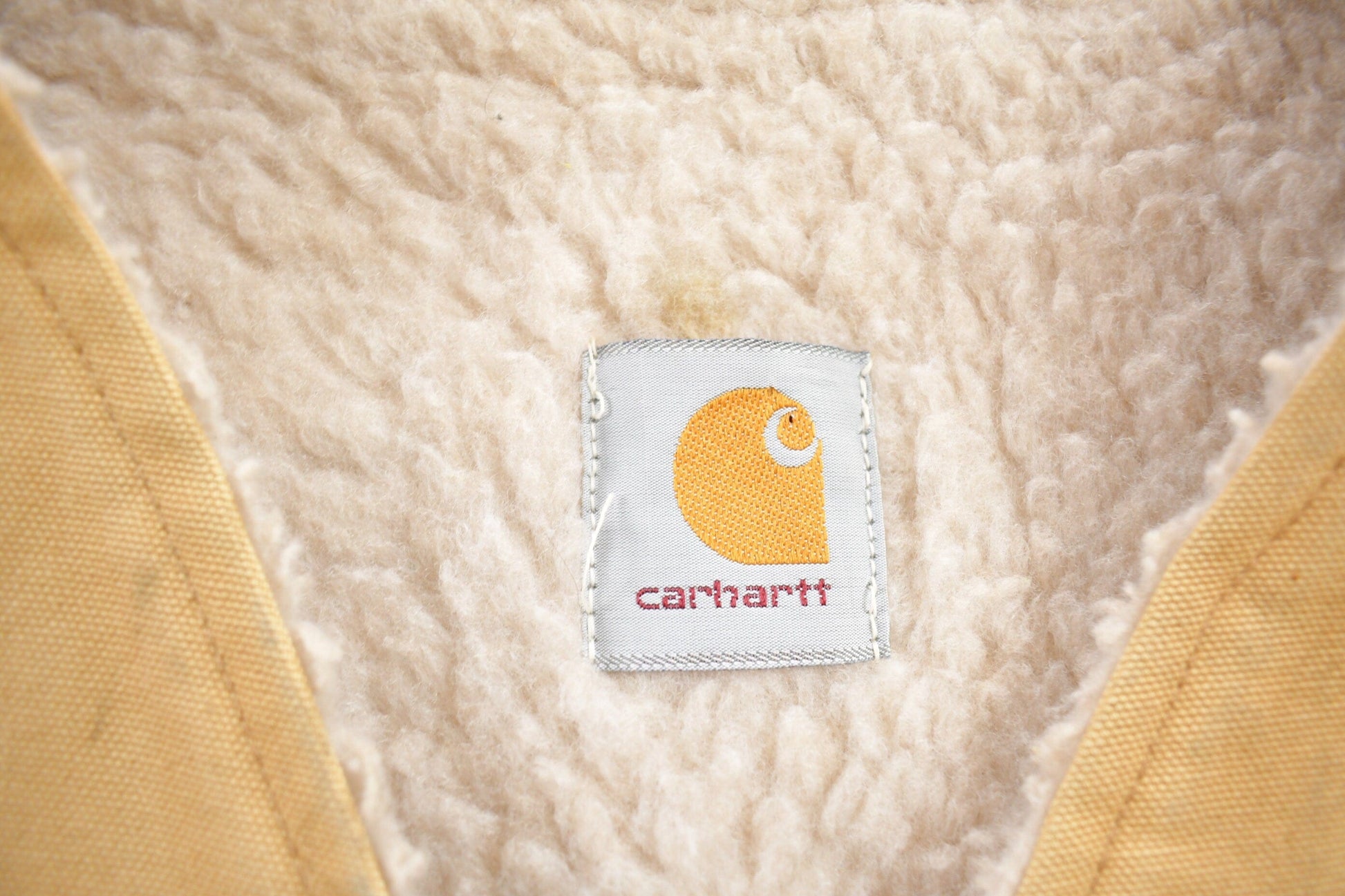 Vintage 1980s Carhartt Sherpa Lined Beige Work Vest Men's Large from propervintagecanada