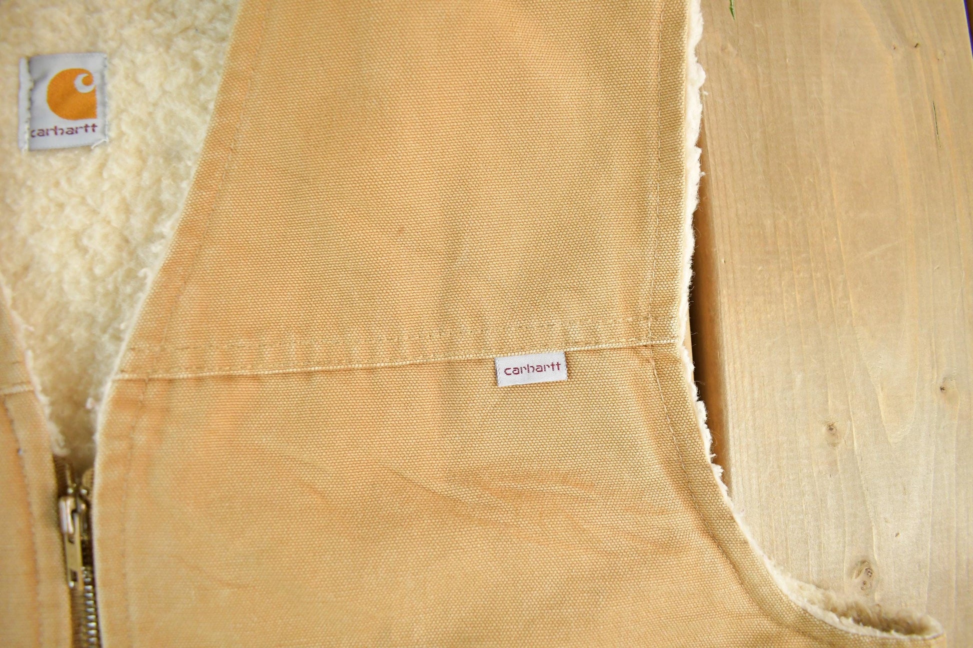 Vintage 1980s Carhartt Sherpa Lined Vest Jacket Mens Large Tall from propervintagecanada
