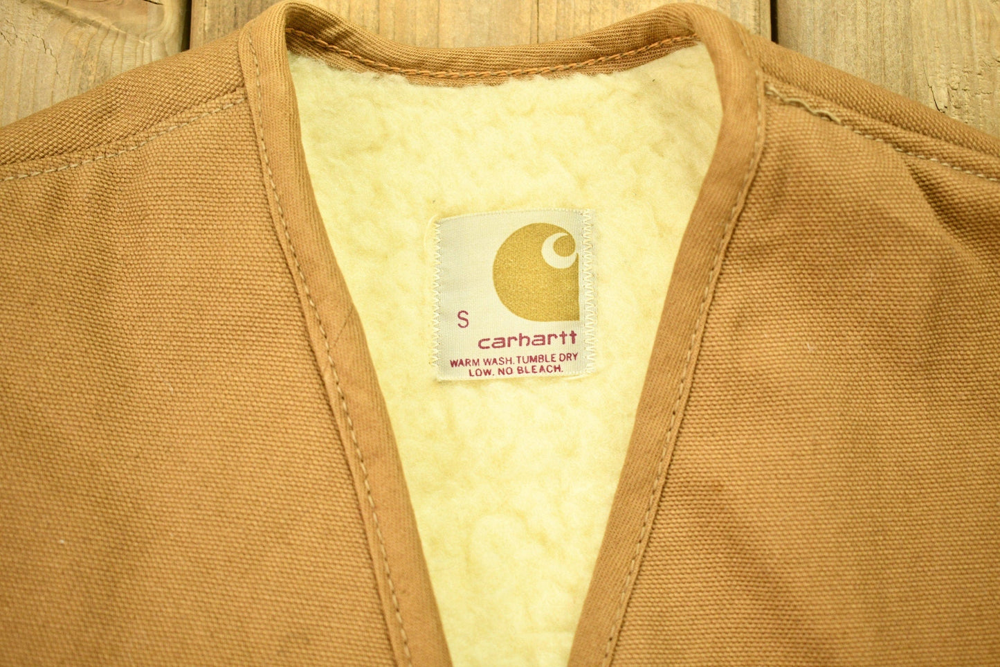 Vintage 1980s Carhartt Sherpa Vest Men's Small from propervintagecanada