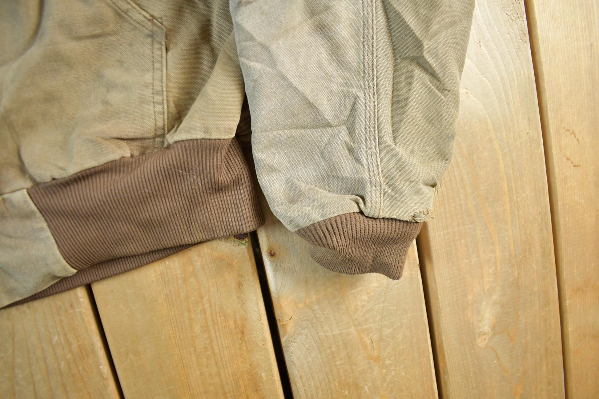 Vintage 1980s Carhartt Sun Faded Distressed Canvas Hooded Work Jacket Men's Large from propervintagecanada