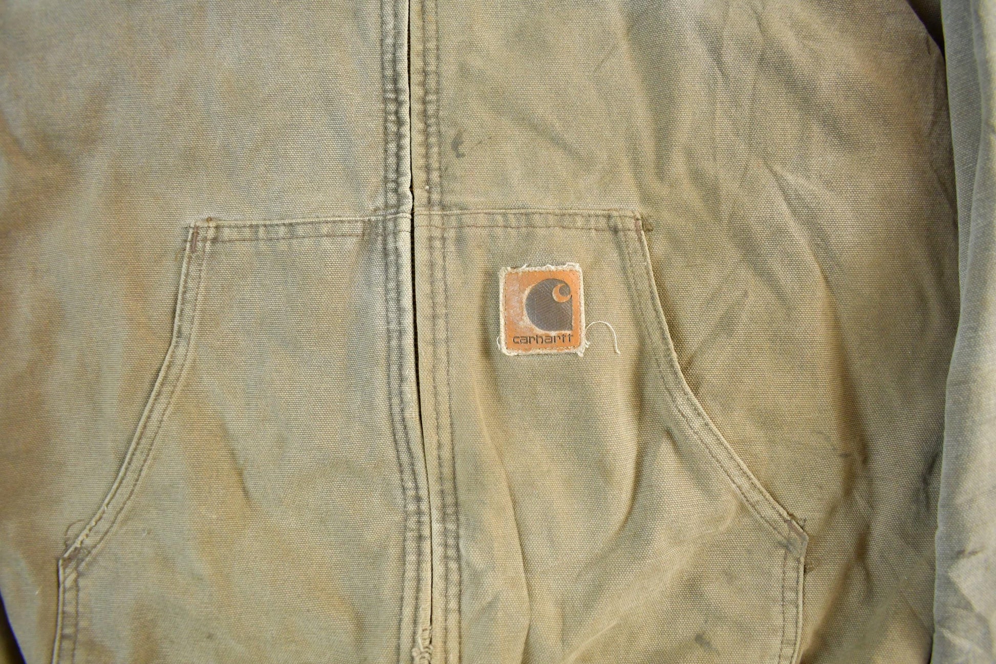 Vintage 1980s Carhartt Sun Faded Distressed Canvas Hooded Work Jacket Men's Large from propervintagecanada