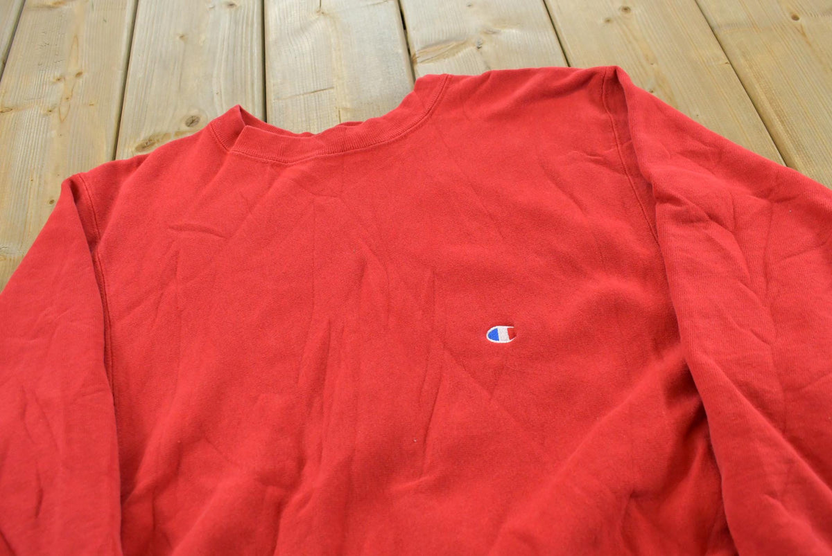 Vintage 1980s Champion Blank Red Reverse Weave Warm Up Crewneck Sweatshirt Men's M / Made in USA / 80s Streetwear from propervintagecanada