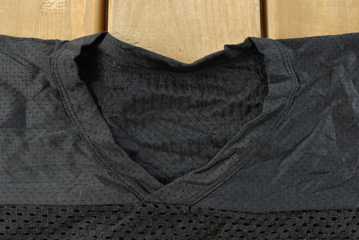 Vintage 1980s Champion Collegiate Blank Football Jersey Men's L from propervintagecanada