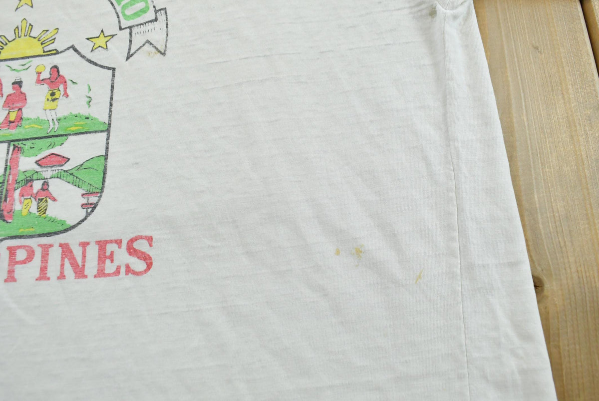 Vintage 1980s City of Baguio Philippines Souvenir Travel T-Shirt Men's L from propervintagecanada